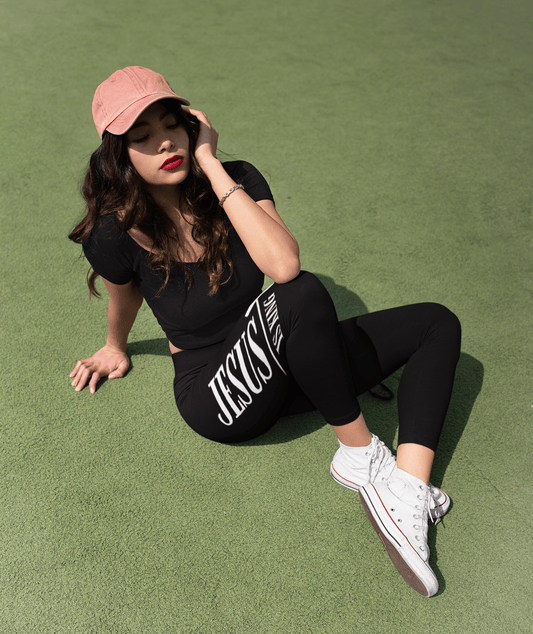 Jesus Is King Stretchy Leggings - Faith - Inspired Activewear for Women - Havenly Essentials - All Over Prints - Printify - 31844494389107658111 - Jesus Is King stretchy leggings for women in a workout setting. Close - up of faith - inspired lettering on activewear.